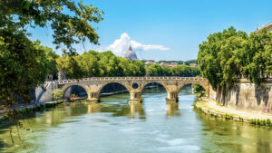 Ponte Sisto, Italy - a bridge on a river on a sunny, summer day.